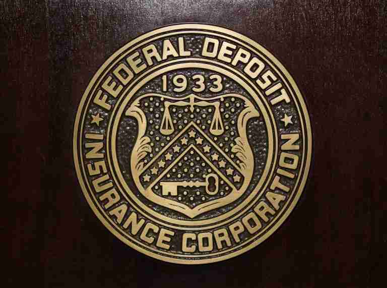 Analysis-Big bank deals stalled by Trump volatility even as officials signal deregulation