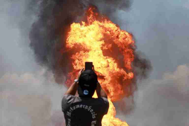 Towering blaze in Malaysia on Petronas pipeline, 63 sent to hospital