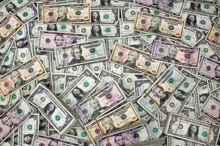 Dollar falls as prospect of tariff talks calms global markets