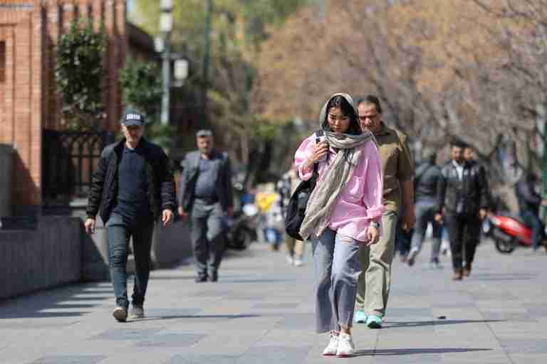 Anxious Iranians hope nuclear talks may ease risk of US attack