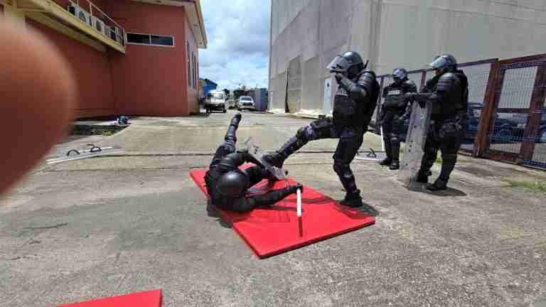 Local soldiers in crowd control training overseas