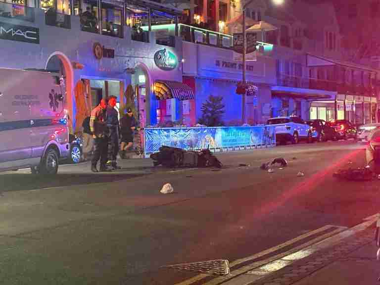 Motorcyclist and electric bike rider collide on Front Street