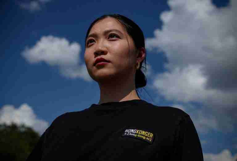 Hong Kong police arrest father and brother of wanted activist Anna Kwok