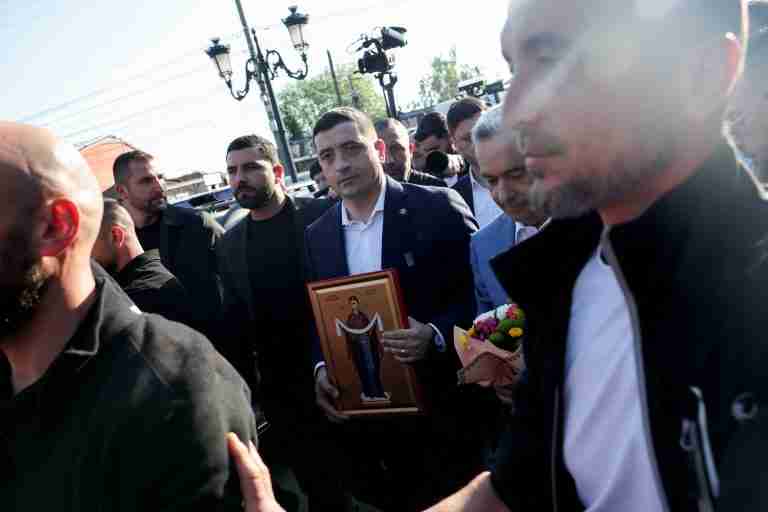 Romanian hard-right candidate Simion leads presidential election, exit polls show
