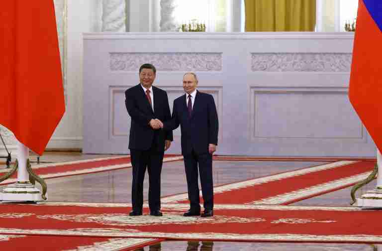 At Kremlin talks, Putin and Xi cast themselves as defenders of world order