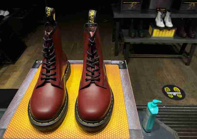 Dr Martens forecasts return to profit growth, shares jump