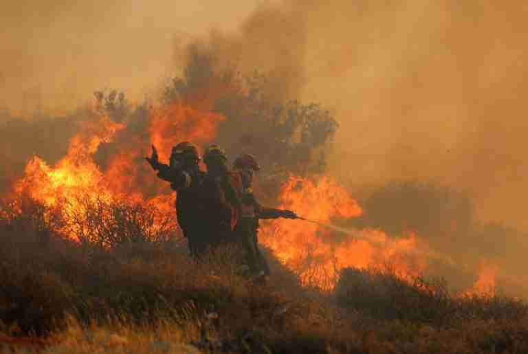 New fire threatens homes in Greece’s Athens, blaze in Crete displaces over 1,000, as Europe bakes in heatwave