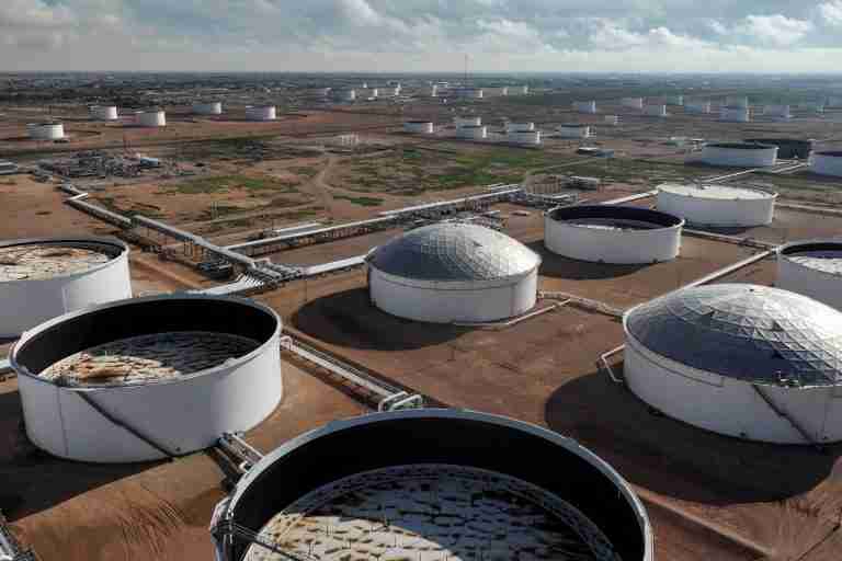Oil prices edge up to two-week high on lower US output forecast, positive US economic news