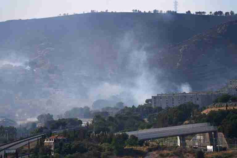 Firefighters battle wildfire threatening French city of Marseille