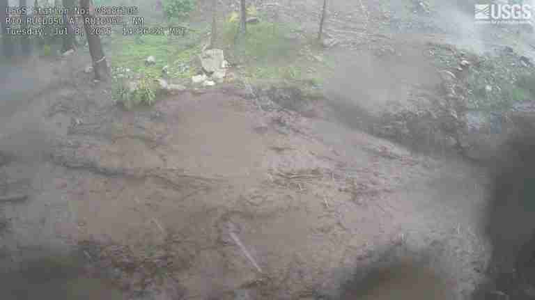Flash floods in New Mexico resort town kill three, trap dozens in homes and vehicles