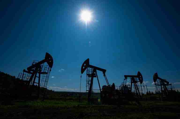 Oil prices gain on summer demand expectations despite wider economy woes
