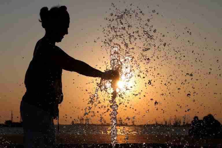 Tourists and labourers seek respite as Greece and Balkans gripped by heatwave