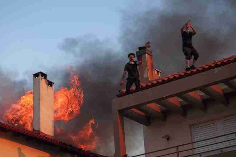 Greece battles wildfires across country, evacuates villages