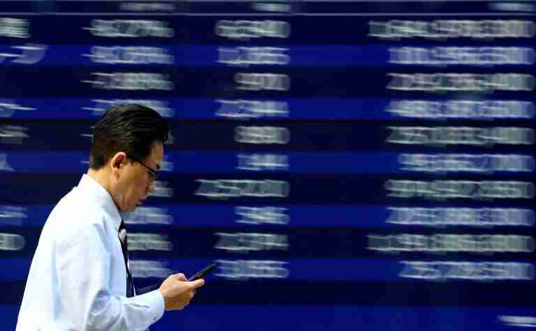Shares retreat slightly, euro dips as tariff costs counted