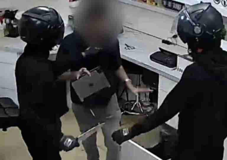 Knife-wielding robbers target tattoo shop