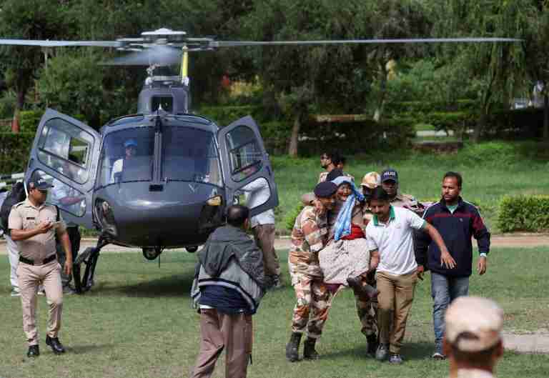Helicopters rescue people stranded by floods on key India pilgrim route