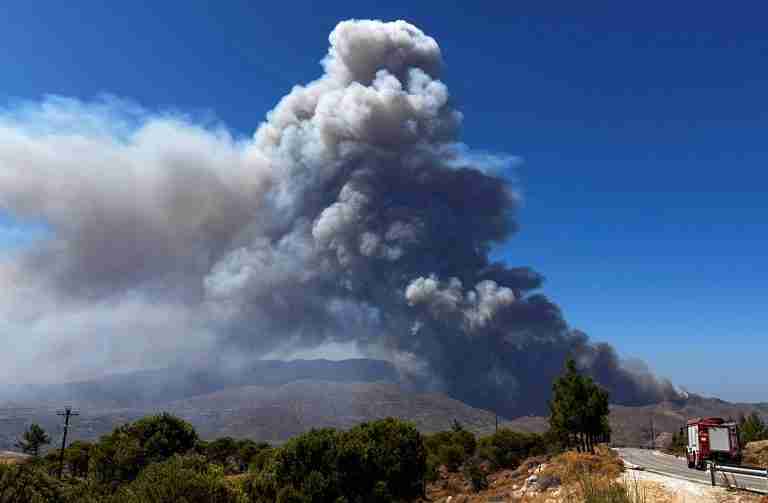 ‘Cooked alive’: Europe’s wildfires hit tourism spots and forests