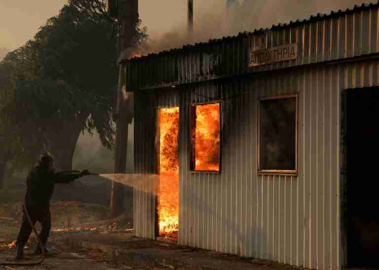 Wildfires scorch Greece for a second day, thousands evacuated