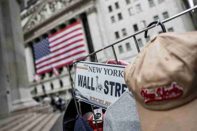 Global stocks near record highs as markets await Trump-Putin talks