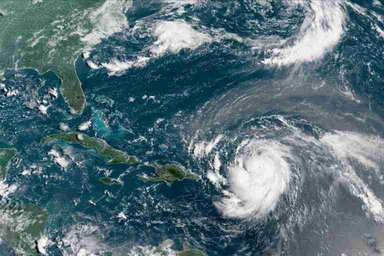 Erin downgraded to Category 3 hurricane, NHC says
