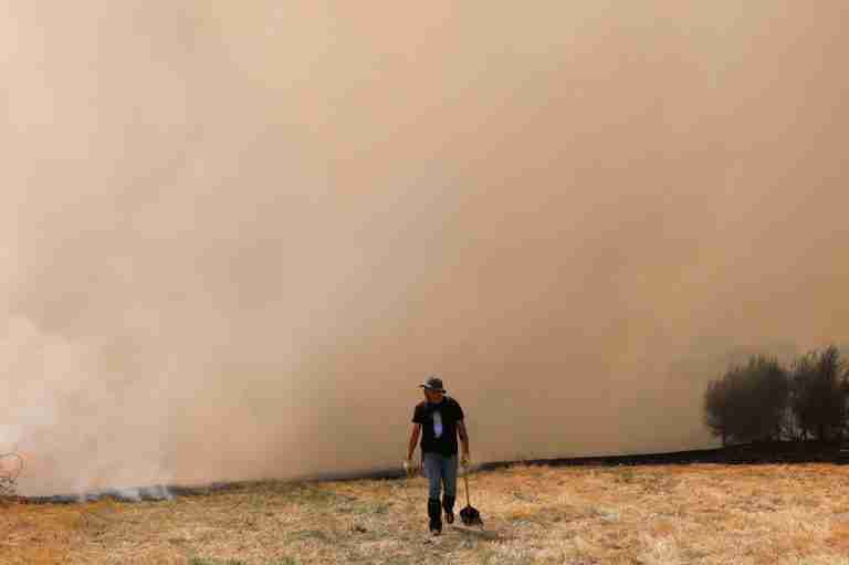 Spain battles 14 major fires with more expected