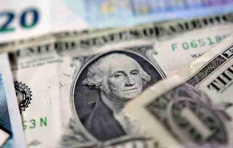 Dollar set for monthly drop on growing US rate cut wagers