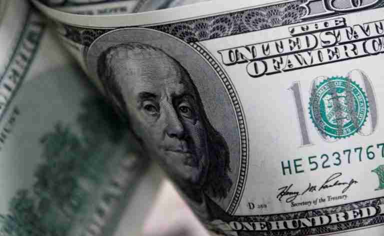 Dollar slides as bond markets stabilise, jobs data looms