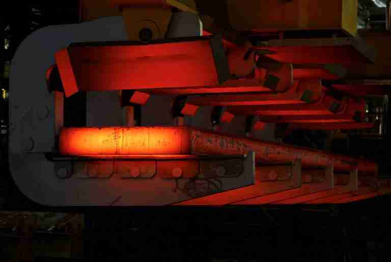 Euro zone industrial output inches up but remains weak
