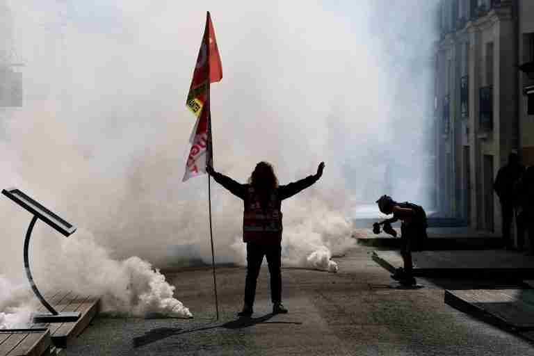French unions strike against austerity, pressuring Macron
