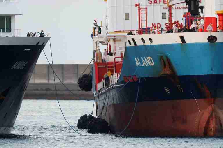 Two test positive as evacuation of virus-hit cruise ship nears completion