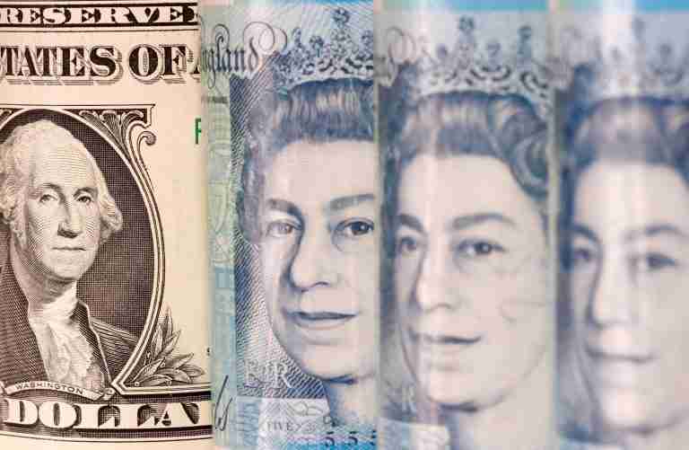 Sterling dips after British inflation cools in April