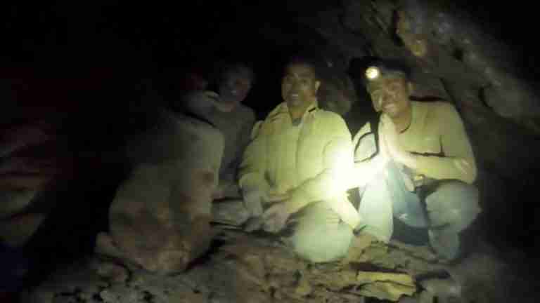 Rescuers pull first trapped person from flooded Laos cave