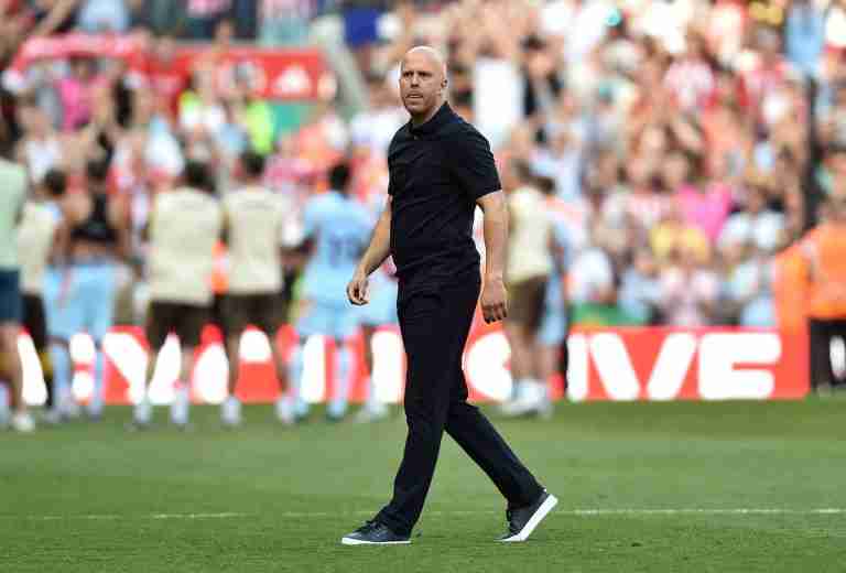 Soccer-Liverpool sack Slot after title defence turns into European scramble
