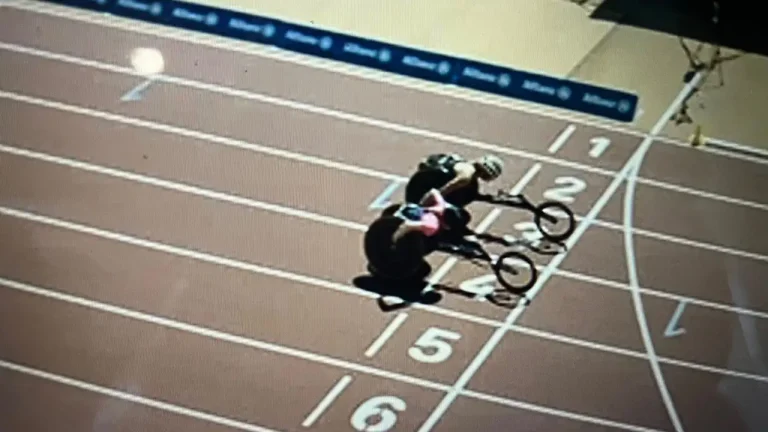 Lewis inches from World Record after dramatic photo-finish win