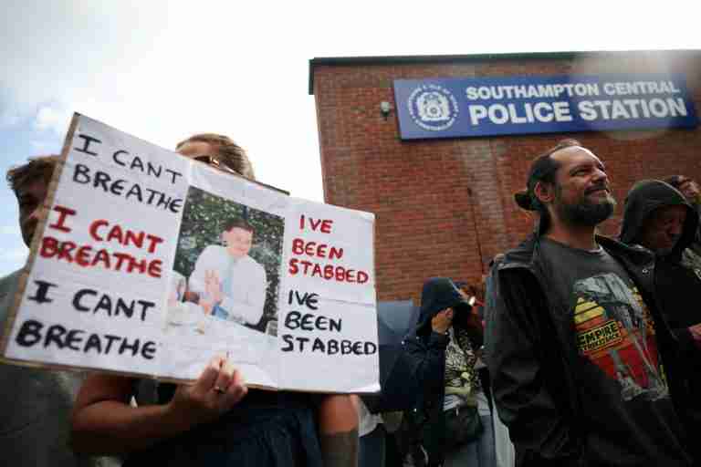 UK police under pressure after dying student was handcuffed