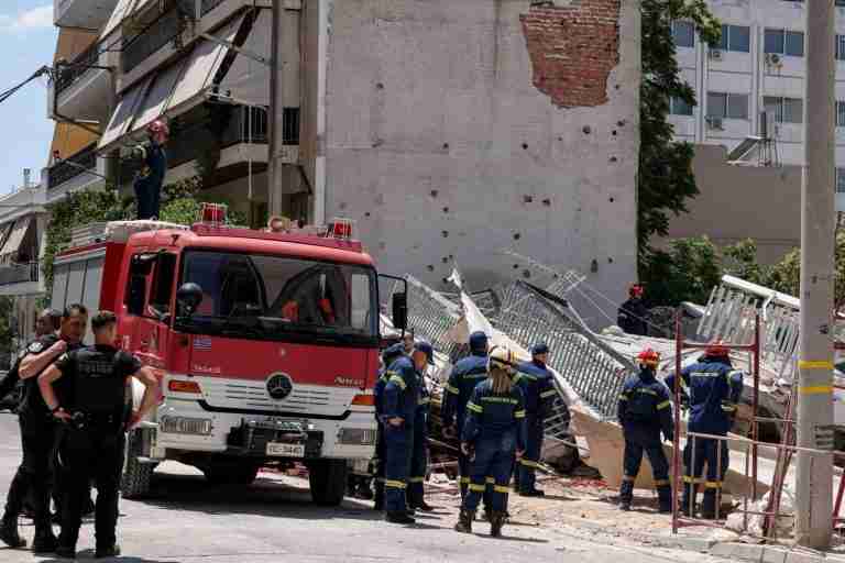 Four trapped after residential building collapses in Athens, fire brigade says
