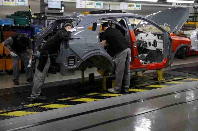 UK manufacturing activity cools despite stockpiling boost to output, PMI shows