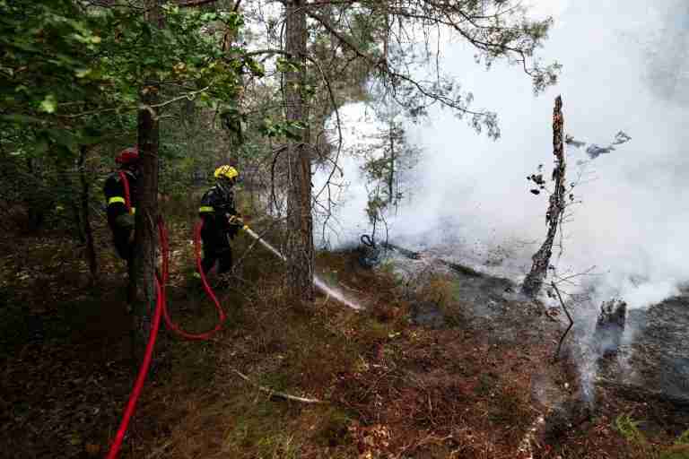 Blaze near Paris burns on as Europe heats up