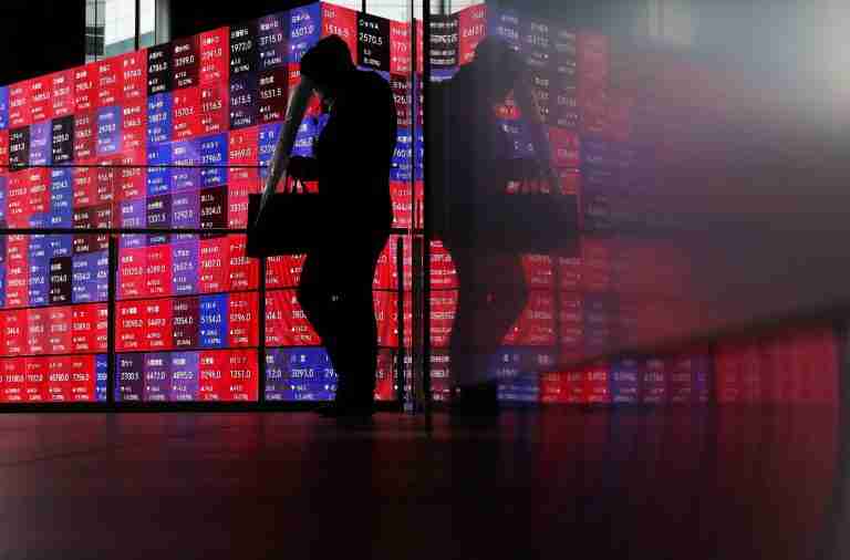 Global stocks climb, oil slides after pause in Middle East fighting 