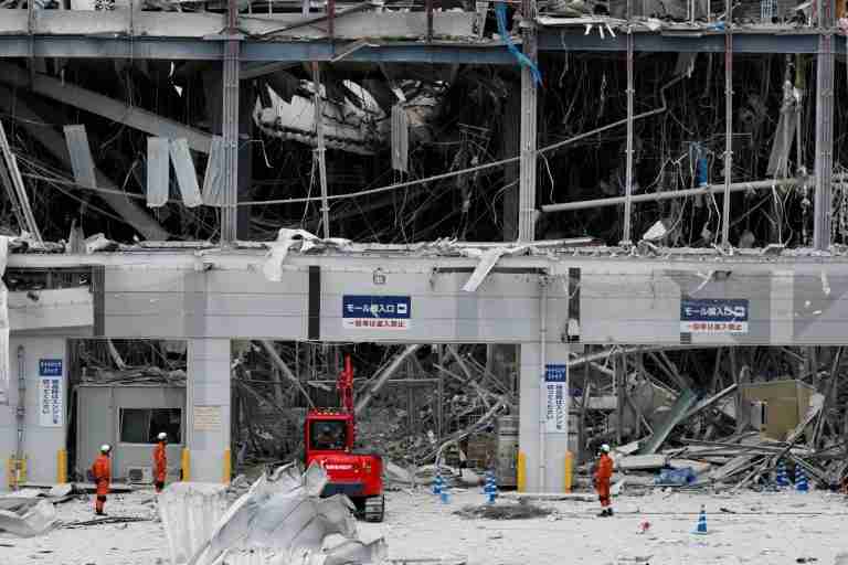 Rescuers haul survivors from wrecked Japan mall as earthquake toll hits 13
