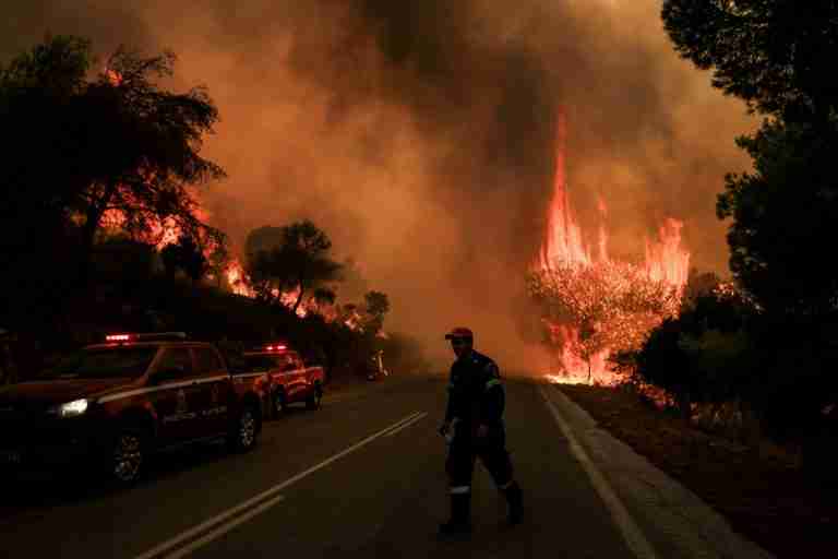 Wildfires rage in Greece as firefighters continue battle in France and Spain