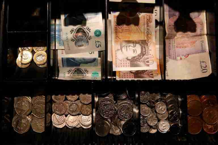 Sterling edges up; UK service sector activity improves 