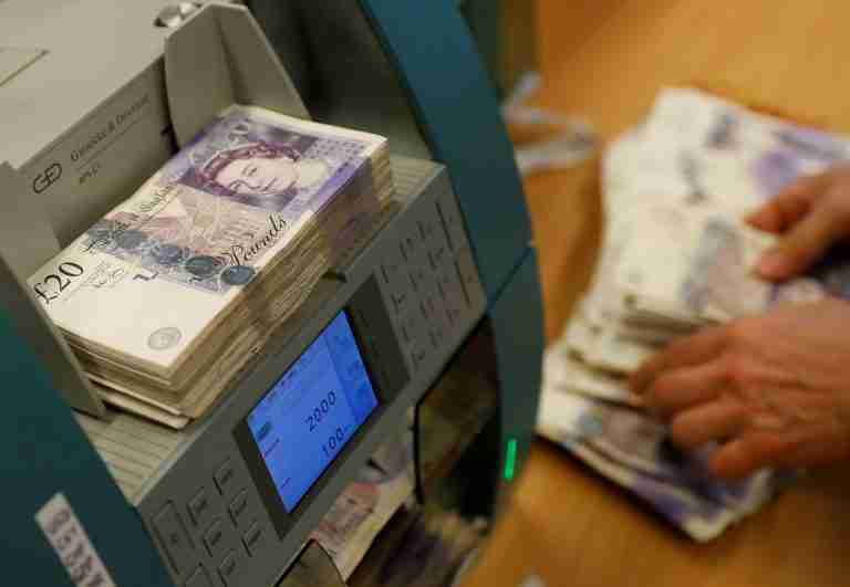 Sterling at one-month high vs dollar before economic data