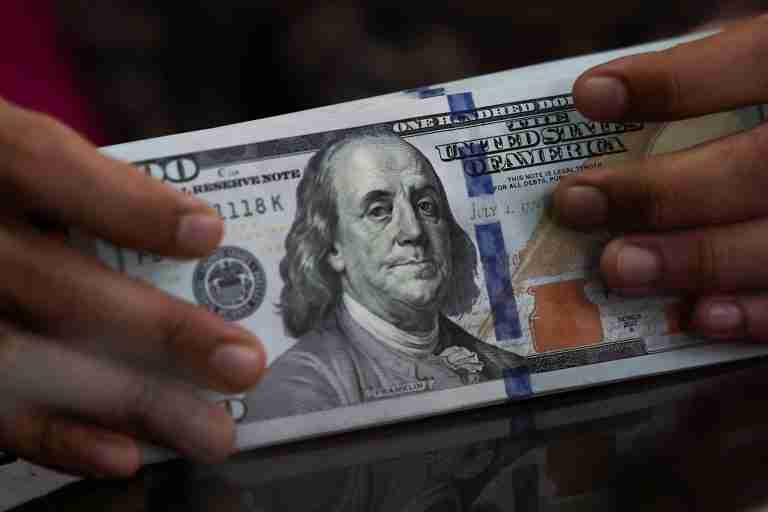 Dollar falls to three-month low as Treasury moves to soothe bond jitters