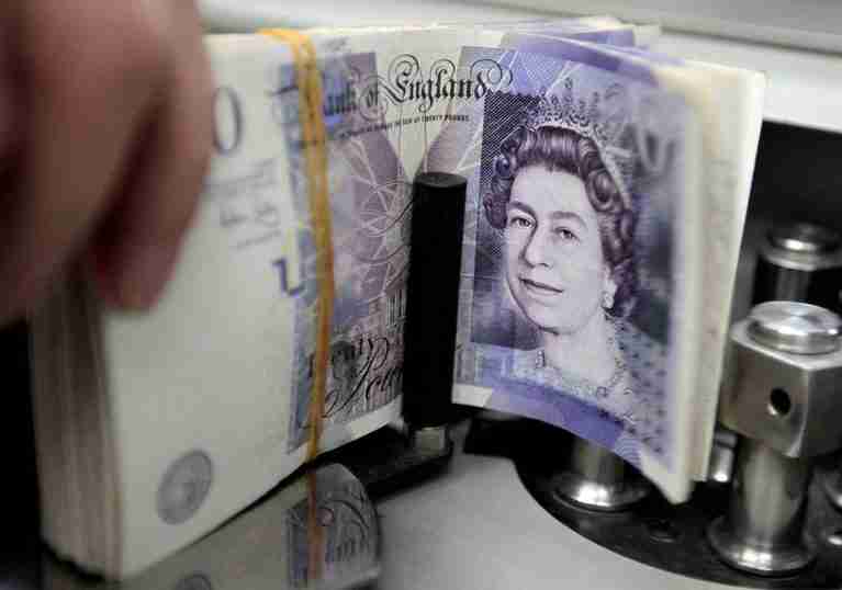 Sterling extends rally on firm rate-hike bets, subdued dollar