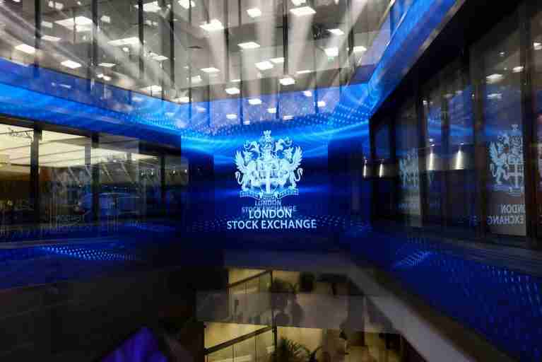 UK shares log weekly gains as banks, miners offset energy drag