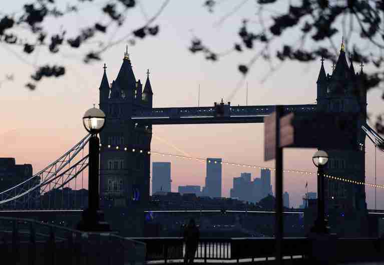 UK services firms suffer surge in costs, raise prices, PMI shows